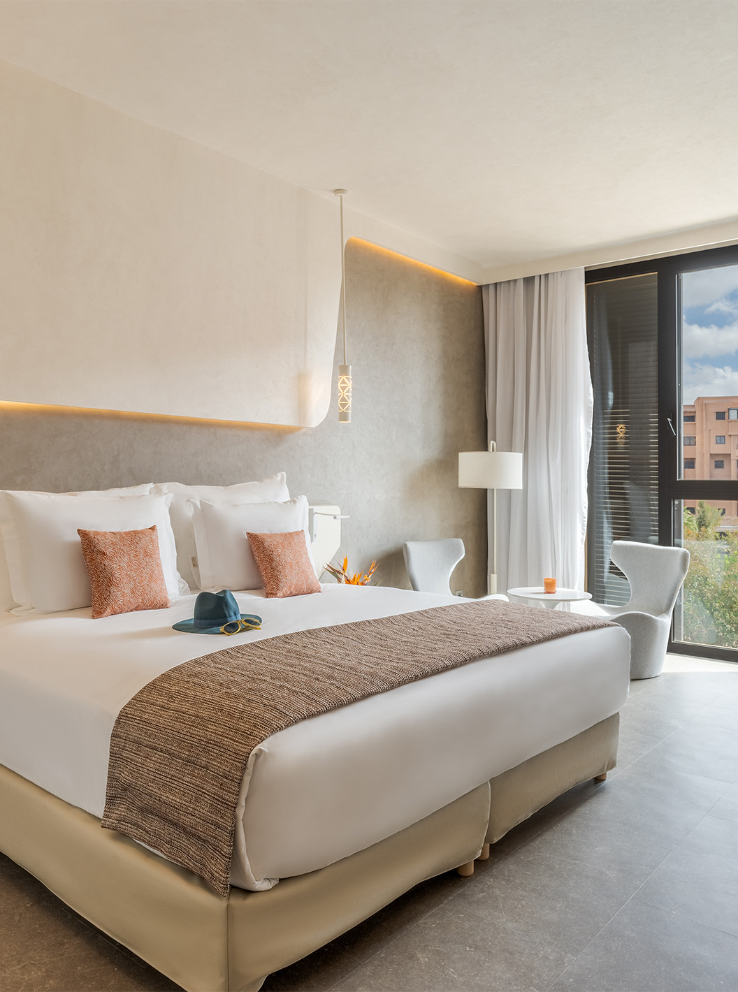 The CR7 Room at Pestana CR7 Marrakech has a comfortable double bed and modern decor in beige tones