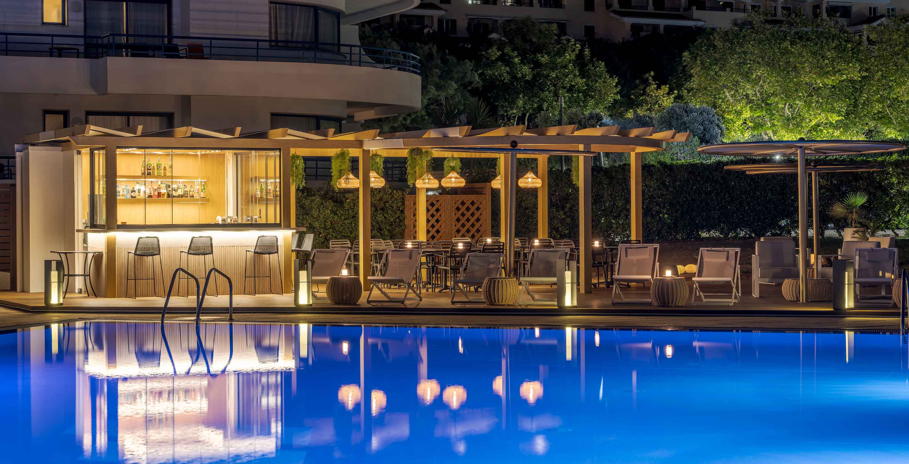 Pestana Cascais, a seafront hotel with pool and spa, has a bar with a terrace next to the pool.