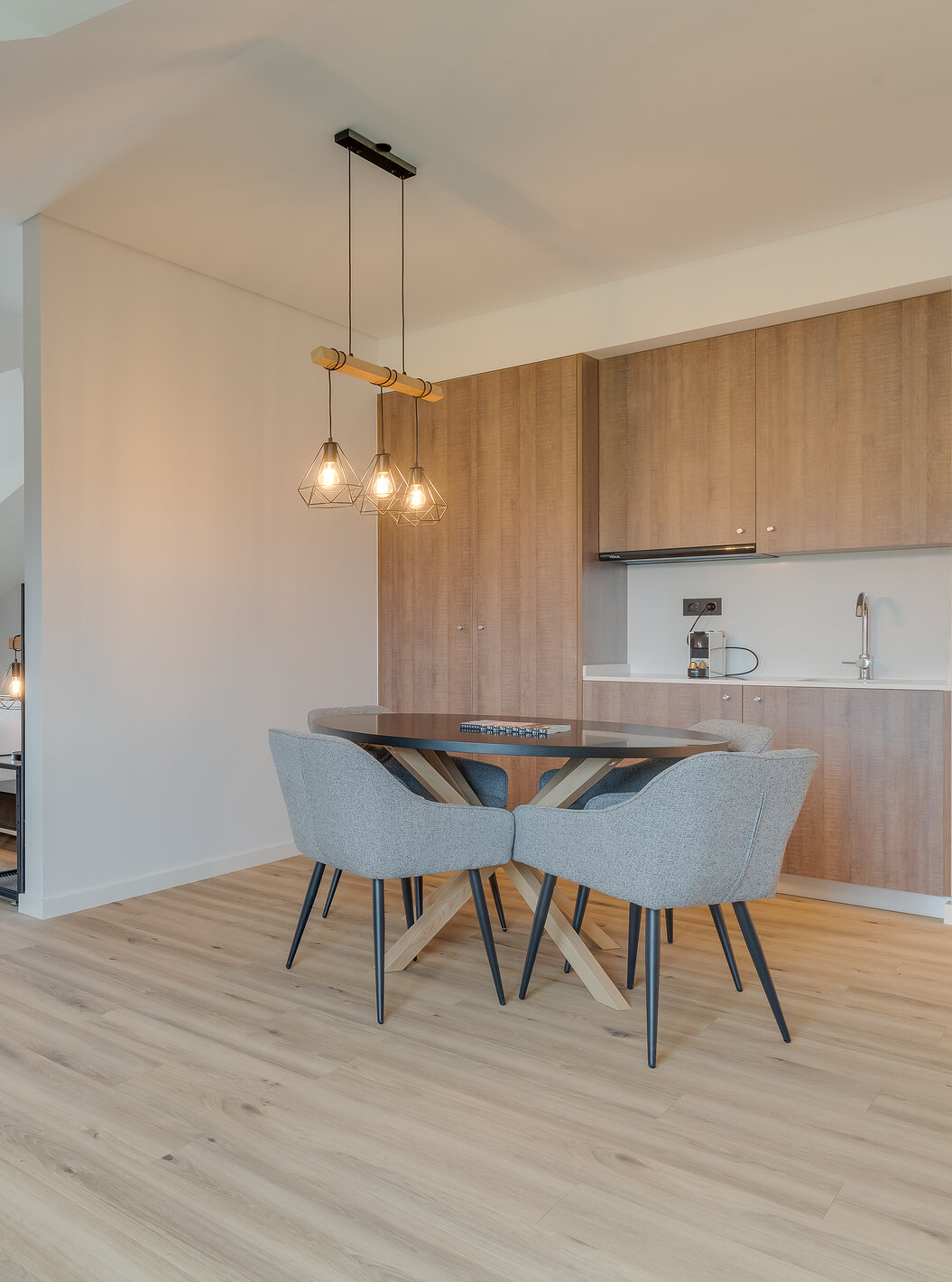 The Suite - Clubhouse of Pestana Sintra Golf has a kitchenette, a dining table, two armchairs, and a desk