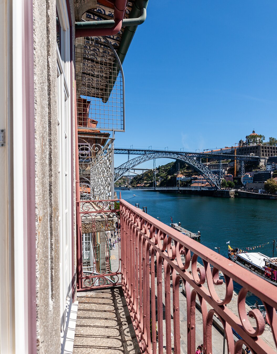 View of the Ribeira and Dom Luís I Bridge from the room of Pestana Vintage Porto, a 5-star hotel in downtown Porto