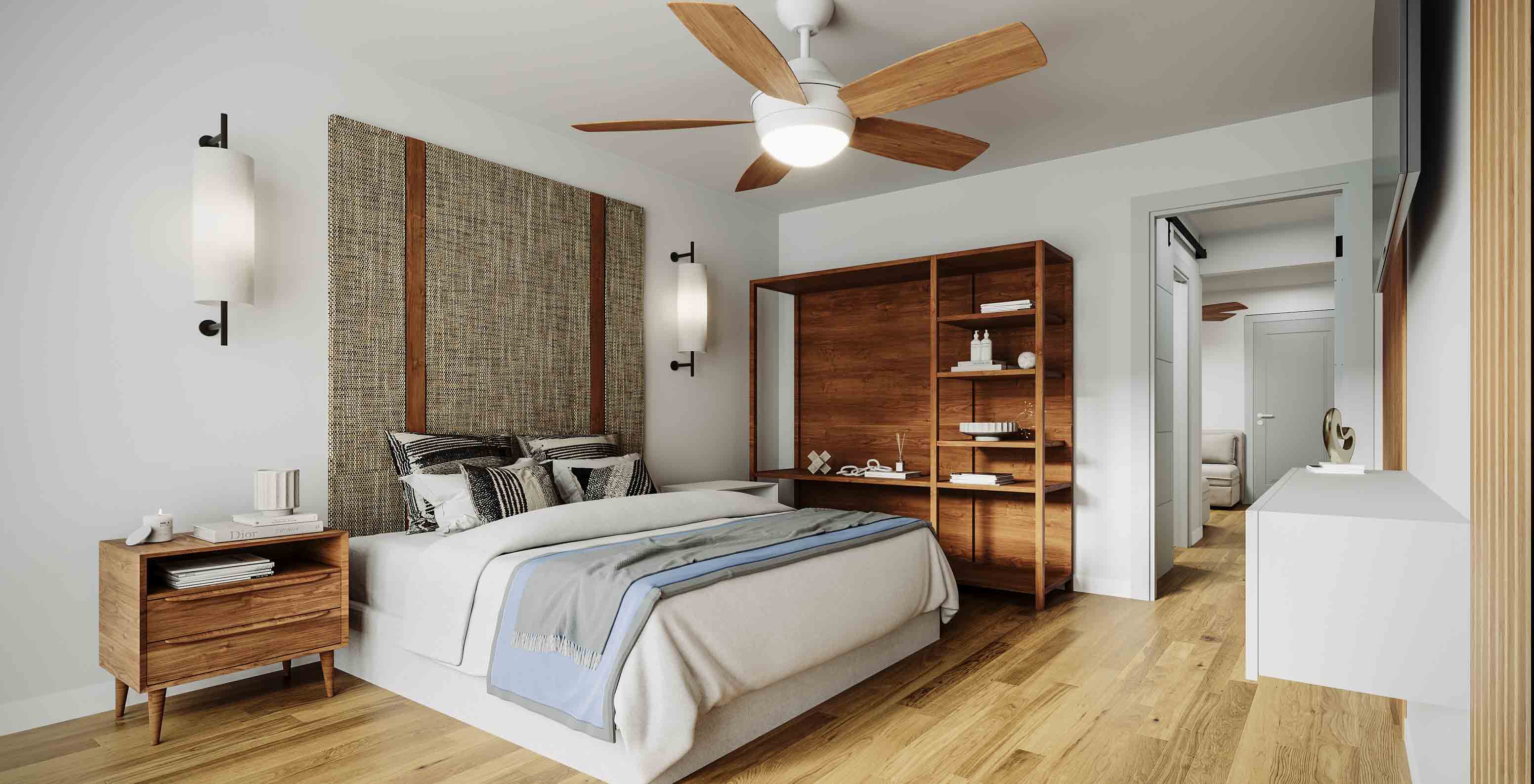 Quarto moderno no Pestana Dunas Porto Santo, com cama, candeeiros de parede e móveis de madeira