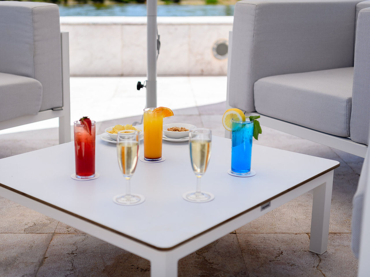 The Pool Bar, at the 5-Star Hotel in Vilamoura, serves fruit cocktails and drinks like champagne