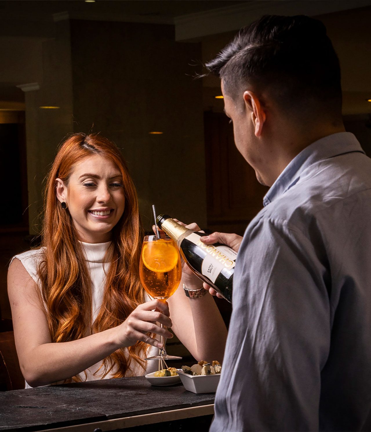 Tango Bar has a bar serving cocktails and appetizers