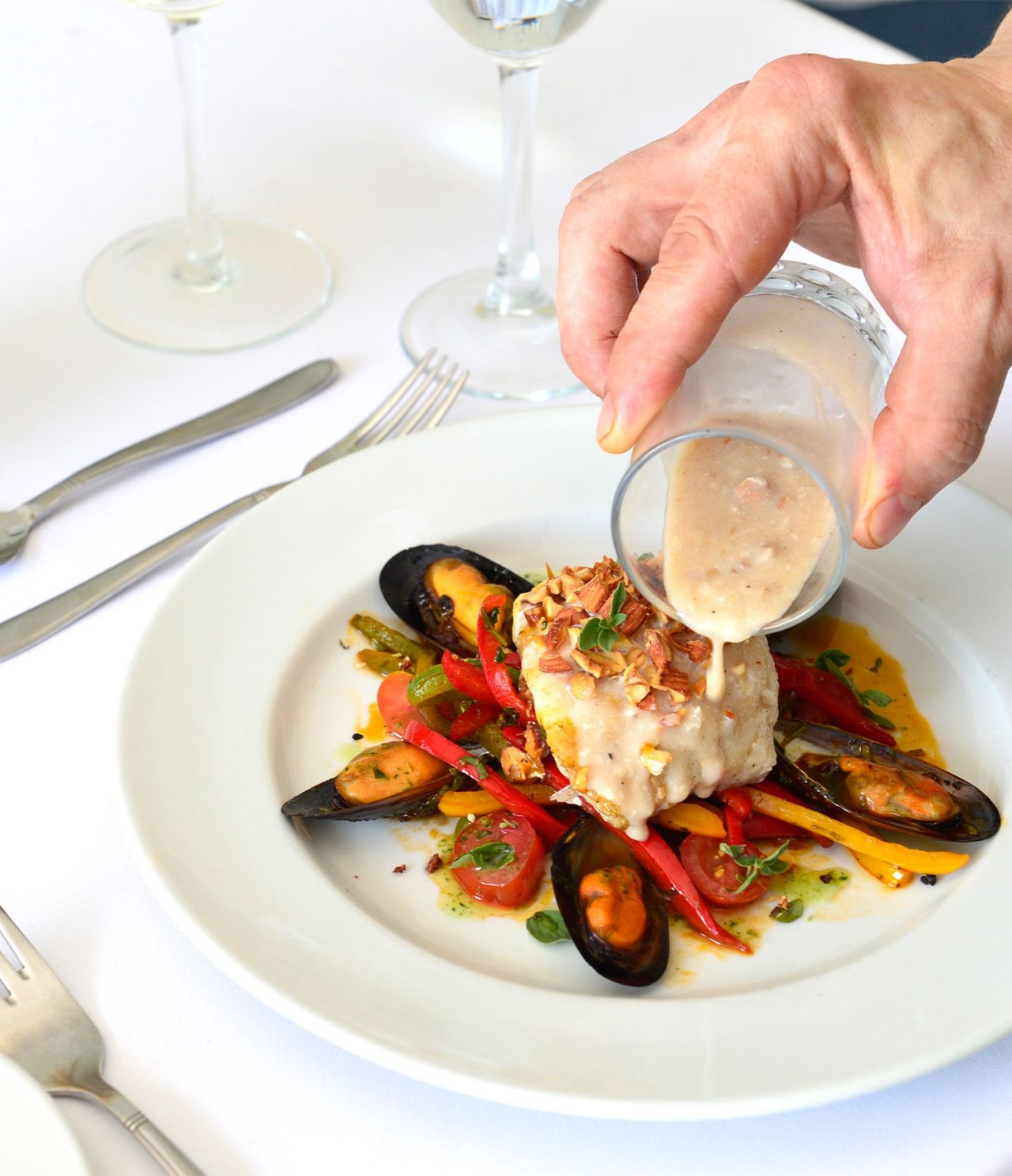 Il Moro serves flavorful dishes like mussels with hake and peppers in sauce